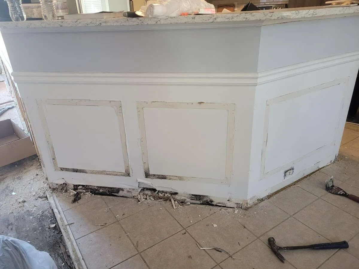 Water damage and mold on kitchen during Storm Damage Restoration in Town and Country